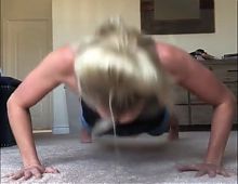 Beautiful blonde doing push-ups 