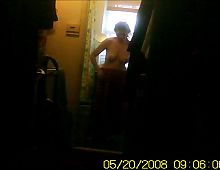 voyeur spycam capture big tit milf full strip naked for bath